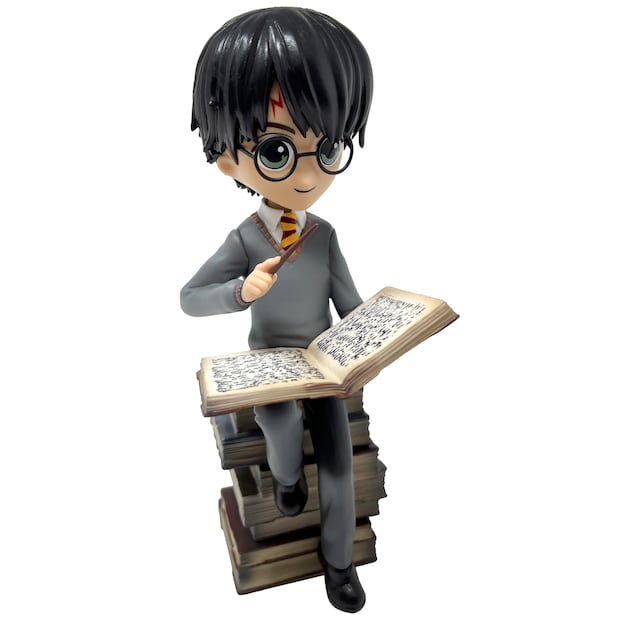 Plastoy Harry Potter figur (Harry and pile of spell books)