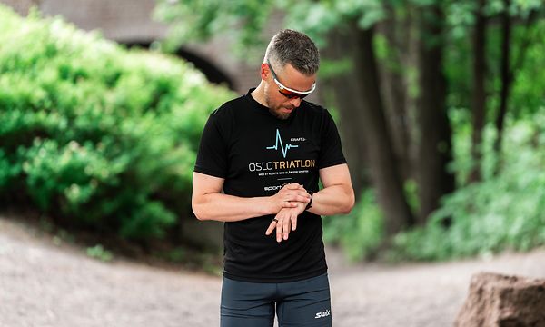 man using smart watch training