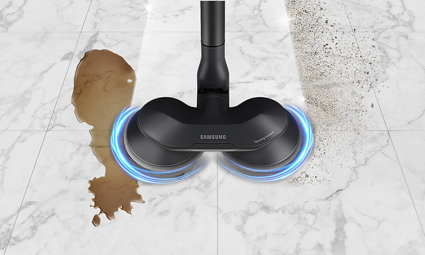 Samsung Jet 75 with the  Spinning Sweeper nozzle cleaning both coffee and dirt from hard floors