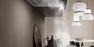 Cooker hood catching steam from a pot